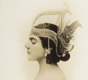 Profile photography of a young woman wearing a Javanese headdress.