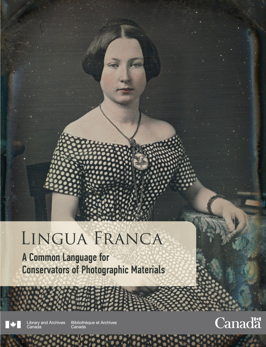 Title of eBook: LINGUA FRANCA: A COMMON LANGUAGE FOR CONSERVATORS OF PHOTOGRAPHIC MATERIALS, Library and Archives Canada. Image of a woman sitting with her arm resting on a table.