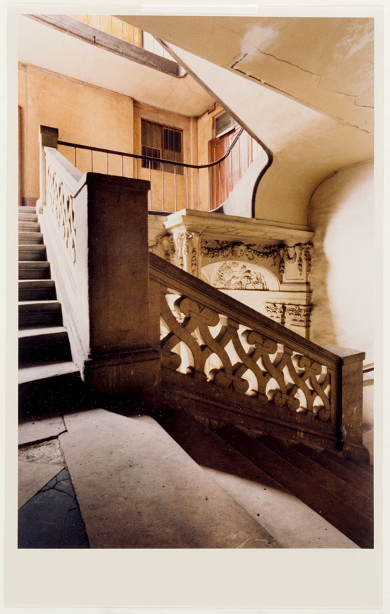 A colour photograph of an interior view of a staircase.