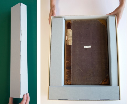 Adhesive-free spacer. A photographic album in a box with three adhesive-free spacers.