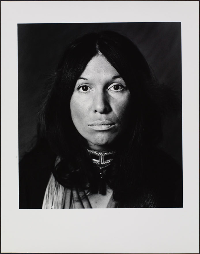 A photograph of a face of a First Nation's woman.