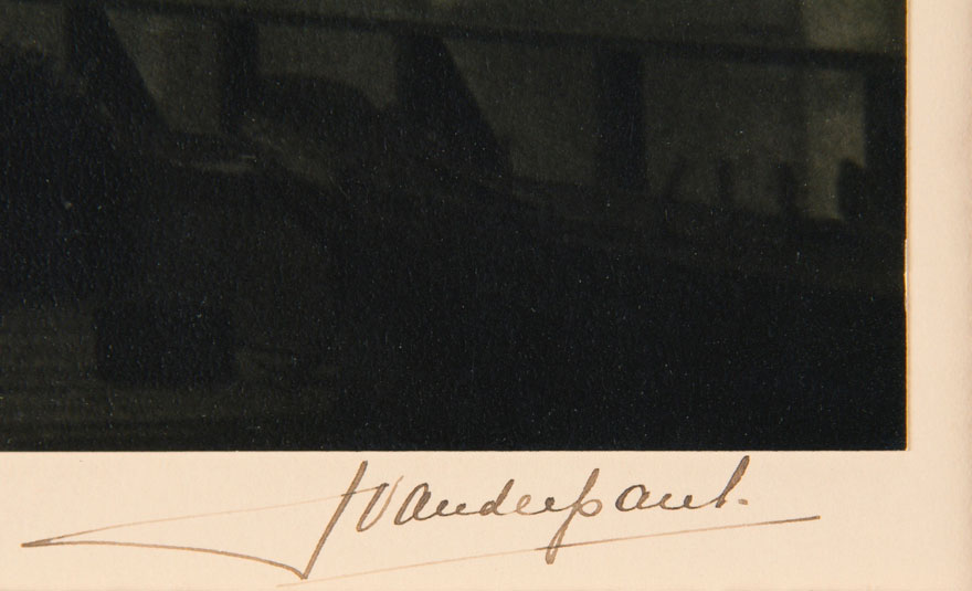 A close-up of an artist's signature.