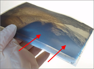 one negative with non-uniform yellow deterioration and silver mirroring on the emulsion side
